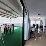 Stunning Top-Floor Beachfront Apartment